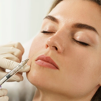 Facial filler being injected into patient